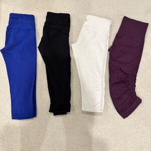 Lululemon cropped leggings bundle size 2 (black & blue) and 4 (white & purple)